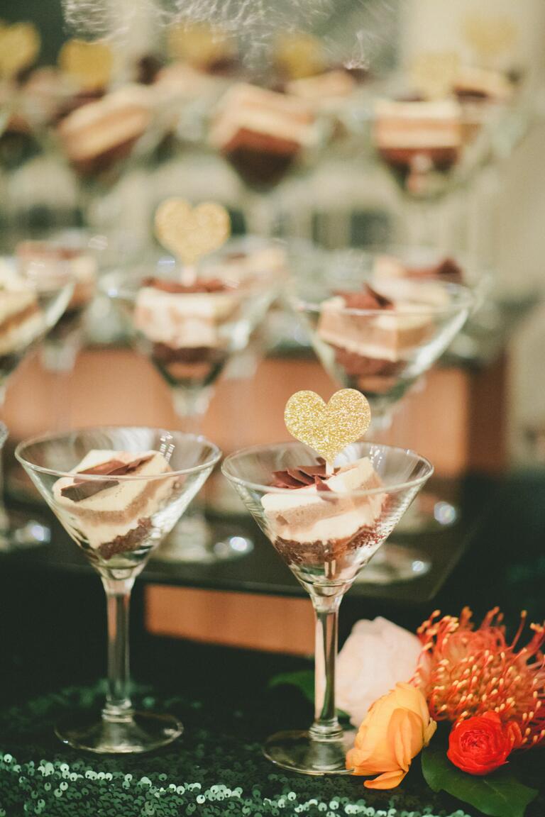 Desserts in martini glasses with heart-shaped wafers