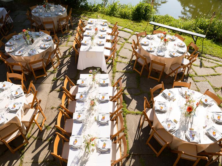 An aerial shot of a lakeside reception