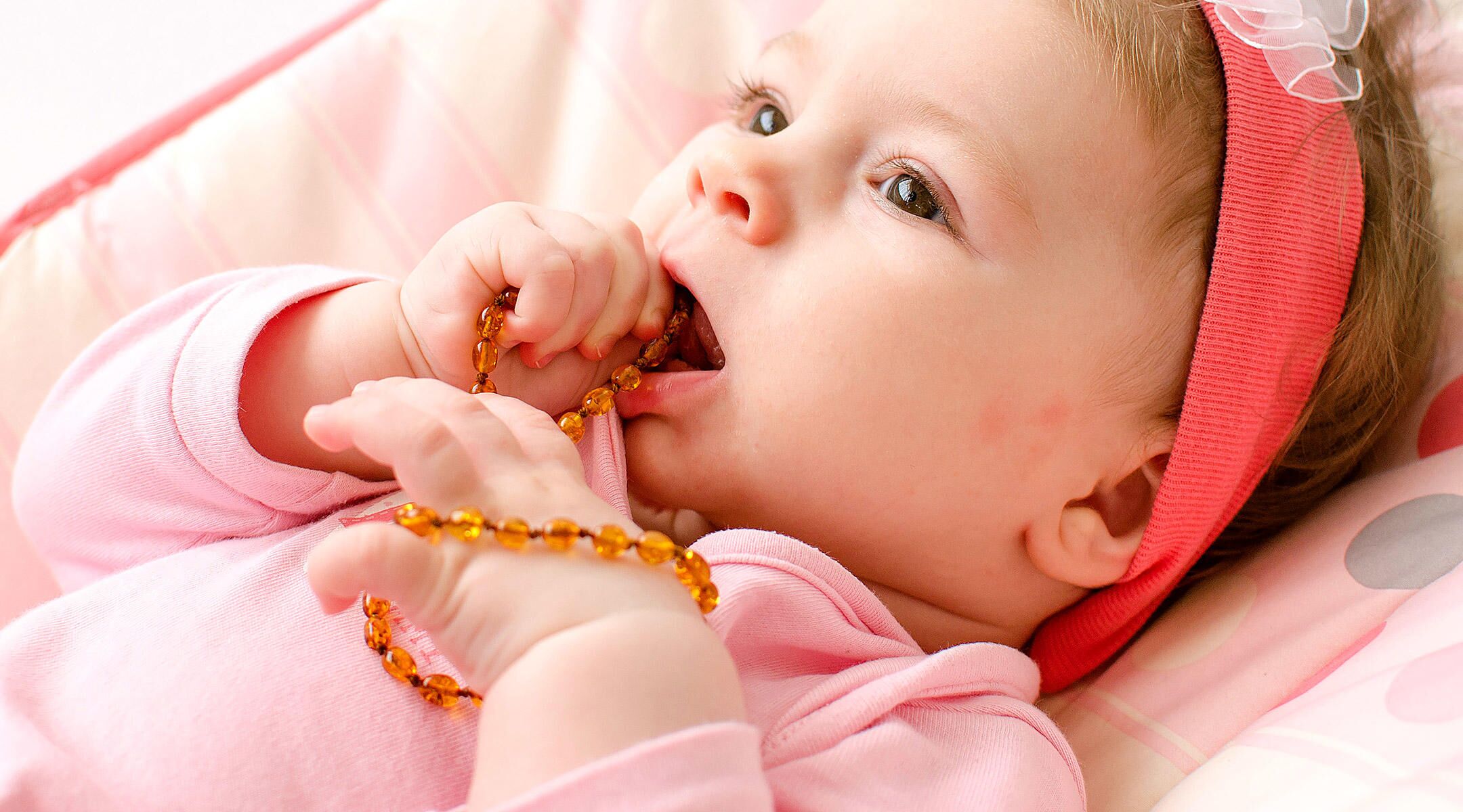 Amber Teething Necklace: Safety Concerns For Baby?