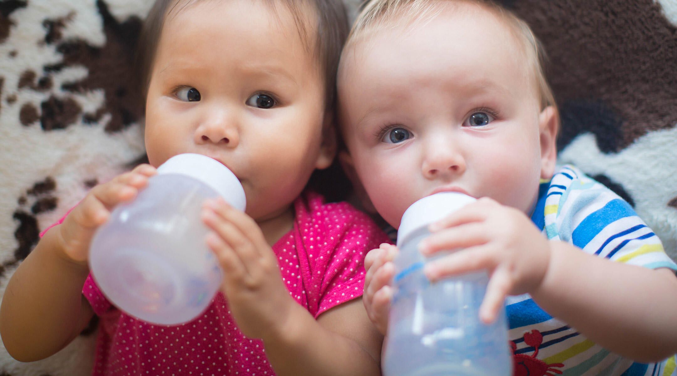 best way to hold a newborn while bottle feeding