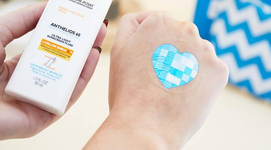 UV patch -- blue heart sticker on hand