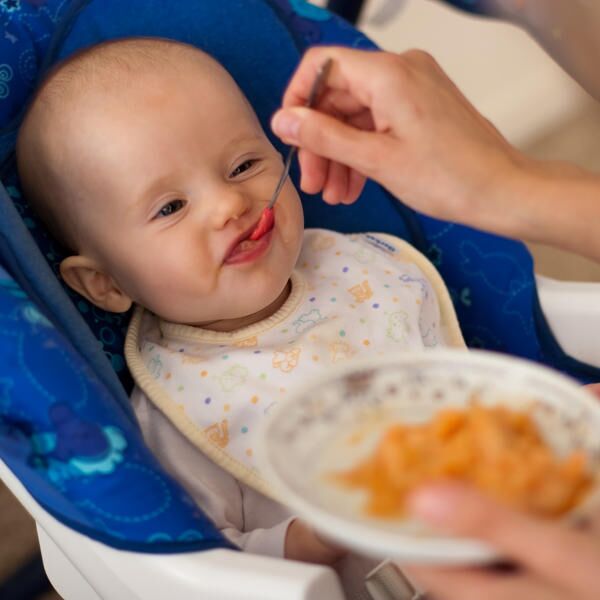 Less Mess, More Fun: How to Feed Baby Her First Solid Foods
