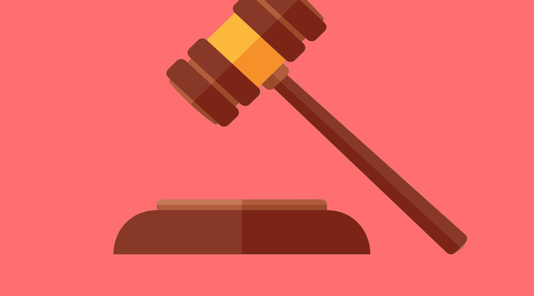 Cartoon image of gavel with teal background 