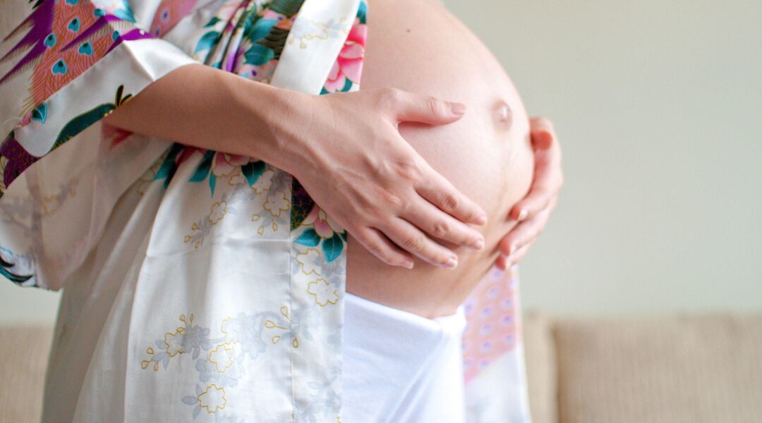woman in late pregnancy belly