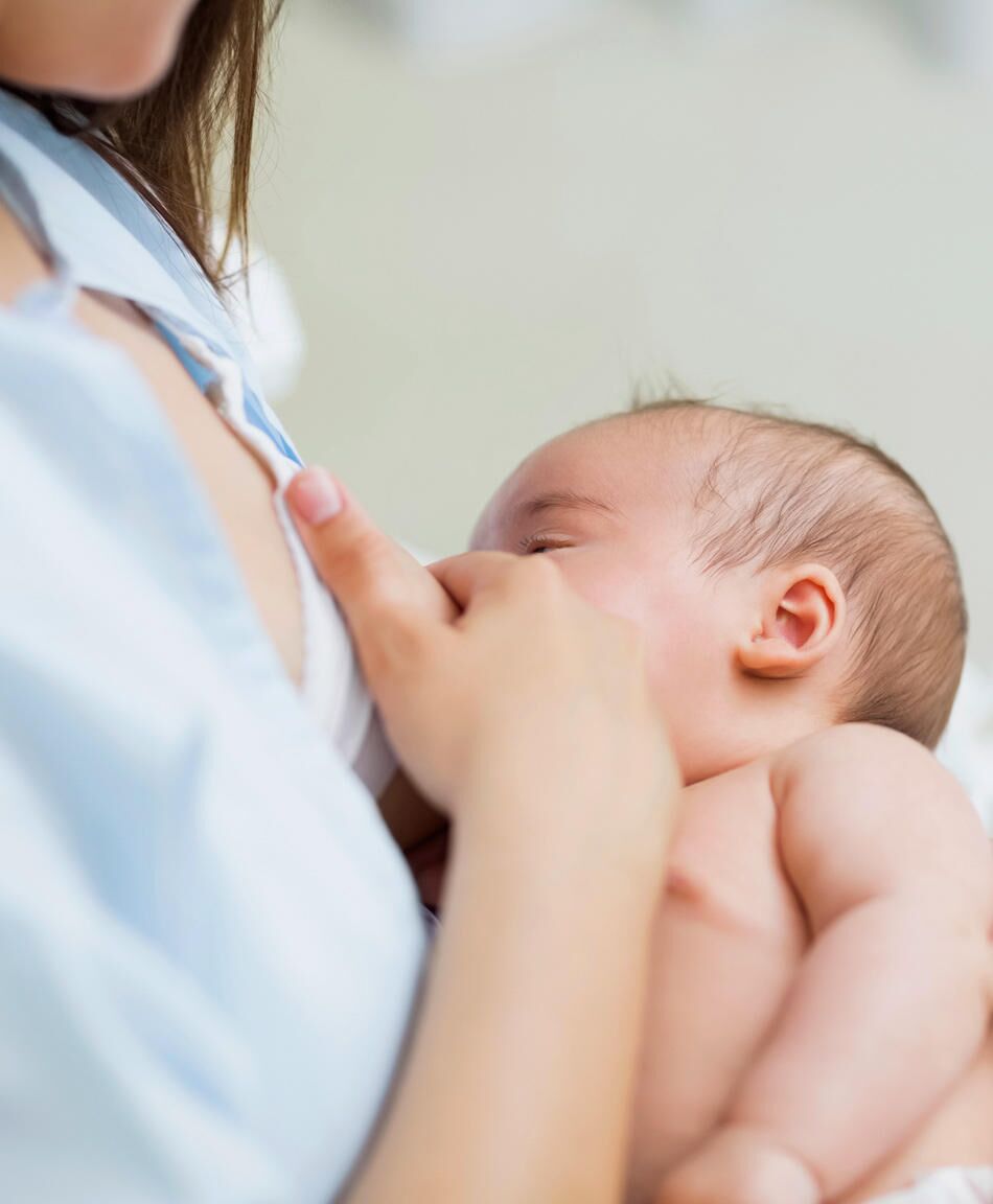 Baby sleeping while store breastfeeding