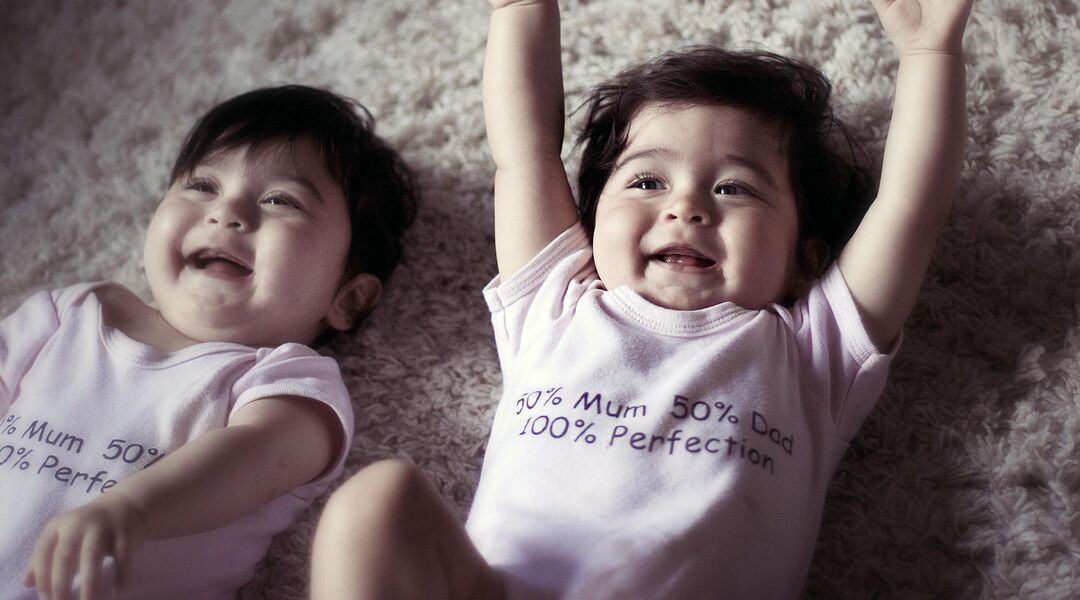 happy excited baby twins