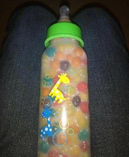 adding cereal to bottle